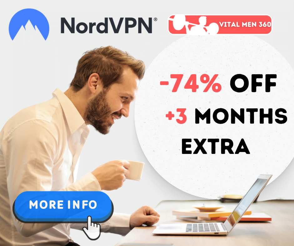 Man sitting at computer drinking coffee and smiling